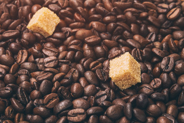 heap of coffee beans with cane-sugar