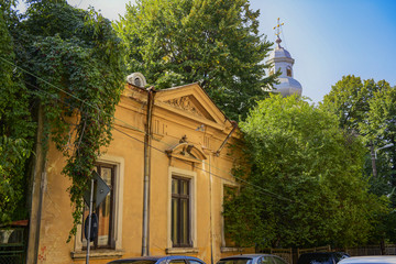 Old and abandoned building with valuable architecture in Bucharest, Romania.