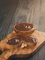 two baguette slices with chocolate hazelnut spread