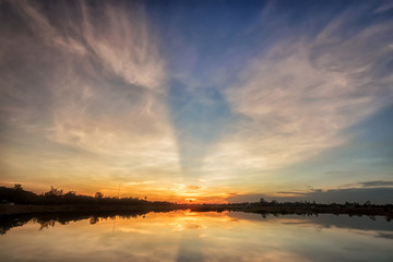 Fototapeta premium Sunset with reflection on the lake