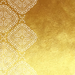 Golden foil background with white lace