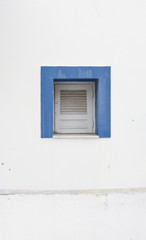 old blue painted wooden window
