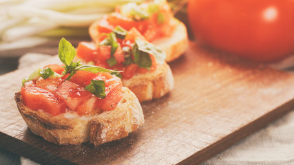 Italian bruschetta with tomatoes onion and basil