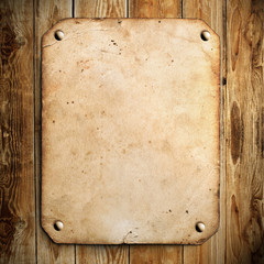 Old paper on the wood background