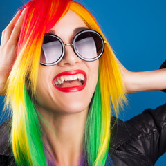 beautiful woman wearing color wig and sunglasses