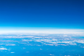 Naklejka na ściany i meble Blue sky and Cloud Top view from airplane window,Nature background