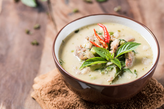 Thai food (Kaeng Khiao Wan),Green curry with pork on wooden background