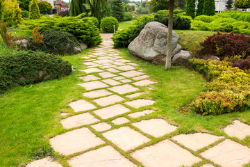 a path made of natural stone in the garden