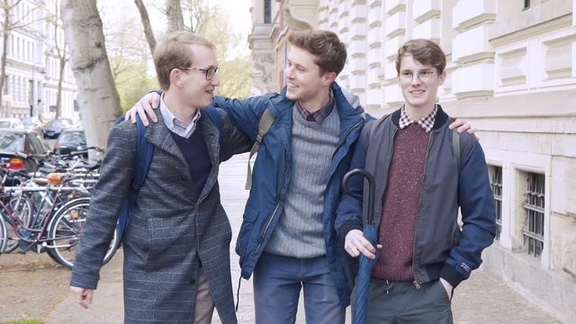 happy meeting of three joyful friends