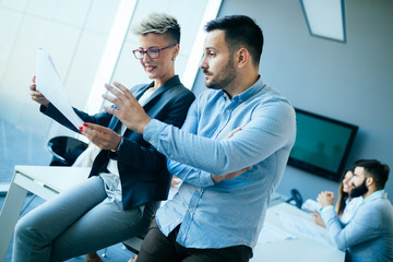 Portrait of architects having discussion in office