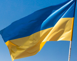 flag of Ukraine against the blue sky