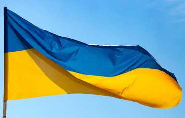 flag of Ukraine against the blue sky