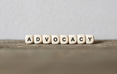 Word ADVOCACY made with wood building blocks