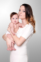 Mother and Baby kissing. Happy Family