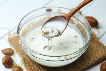 nuts yogurt in glass bowl