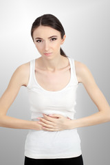 Woman Health. Beautiful Female Feeling Pain In Stomach