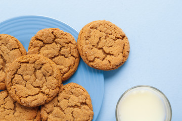 Ginger sparkle cookies and milk. Top down view.