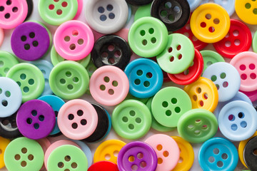 Colorful button assortment filling the frame. buttons texture background