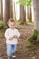 Little boy in the forest