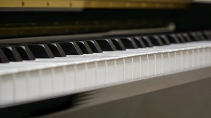 Fototapeta na wymiar Piano keyboard with closeup shot