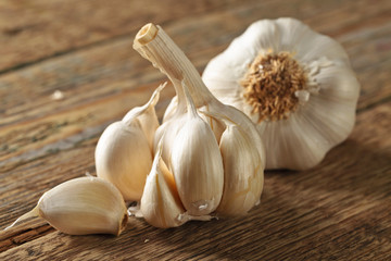 Garlic on wooden table. © Igor Normann