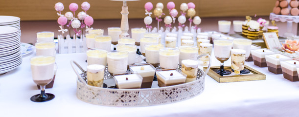 Elegant and luxurious event arrangement with colorful pastries