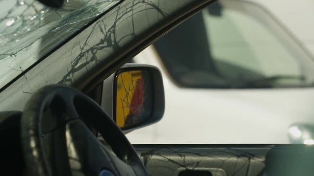  Aggressive astronaut with road rage vandalizing car mirror with baseball bat