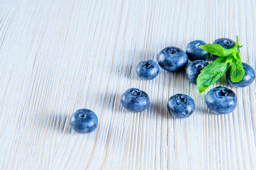 Blueberries with leaves in white background