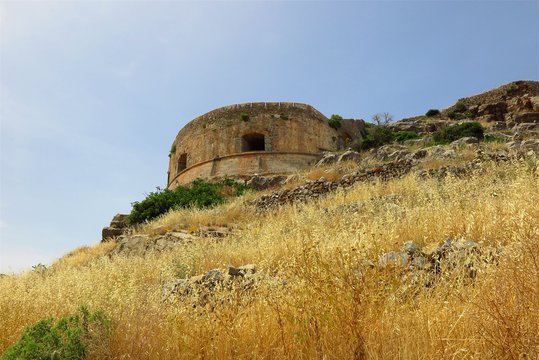 Spinalonga Island, Crete, Greece abandoned tower of former leper colony
