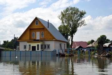 Flood. The river Ob, which emerged from the shores, flooded the outskirts of the city.