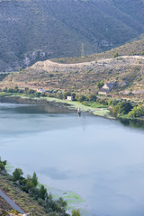 Fototapeta na wymiar The river Ebro on its way through Mequinenza, Aragon