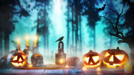 Spooky halloween pumpkins on wooden planks