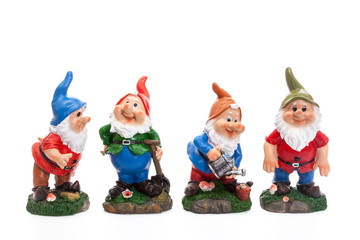 Four Garden Gnomes isolated on white background, simple figurines to decorate your garden