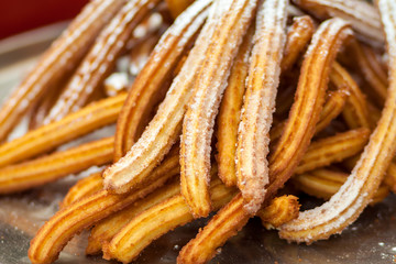 Churros closeup. Traditional Spanish and Portuguese pastry.