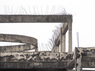 Old reinforced concrete building structure on white background