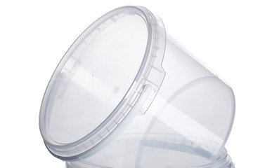 Transparent plastic bucket with transparent lid, plastic containers on white background, food plastic box isolated on white, product packaging for foodstuff or paints, adhesives, sealants, primers