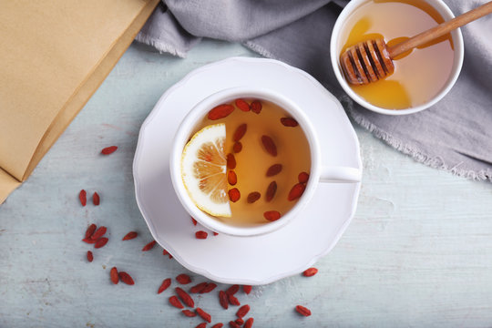 Cup With Goji Tea On Table