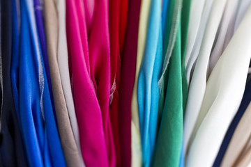 Closeup of colorful fabric samples. Shallow deep of focus.