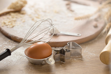 Cake making equipment. wooden rolling pin and Various wooden on brown table
