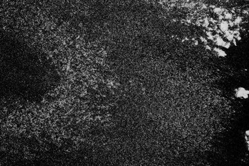 White powder isolated on black background, top view