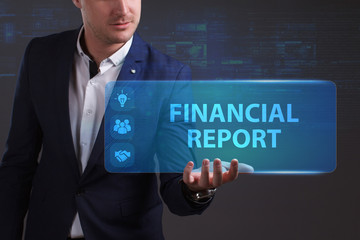 Business, Technology, Internet and network concept. Young businessman working on a virtual screen of the future and sees the inscription: Financial report