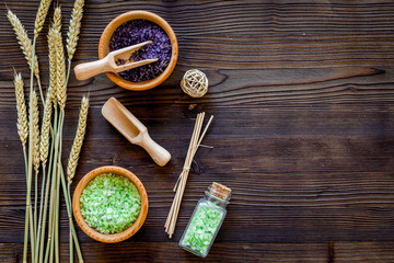 natural cosmetics with wheat and herbs for homemade spa on wooden background top view mock up