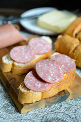 bologna sausage on piece of bread