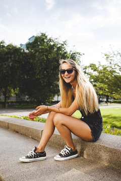 Beautiful female sitting in the park