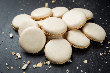 Biscuit sweet cookie background. Domestic stacked butter biscuit pattern concept,close up macro.Homemade cookies on wooden table.Cereal biscuits with the sesame,peanuts,sunflower and amaranth.
