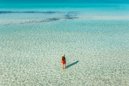 On the distance: woman on a mediterranean beach