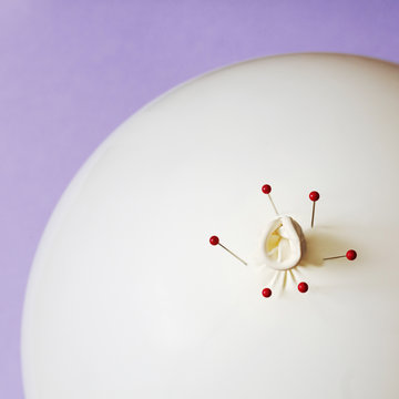 Overhead shot of pins inside balloon