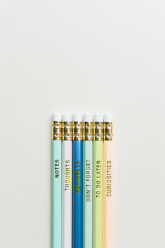 Colorful pencils printed with helpful messages.