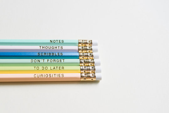 Colorful pencils printed with helpful messages.