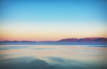 Picturesque morning bay with the traditional nature of Iceland.